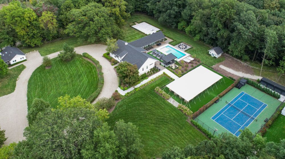 Aerial View of Property with Tennis/Basketball Court & Event Tent