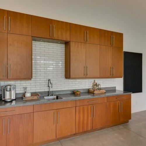 Coffee Nook and Bar Area with tons of glassware, mugs and games for your group in the bottom cabinets!